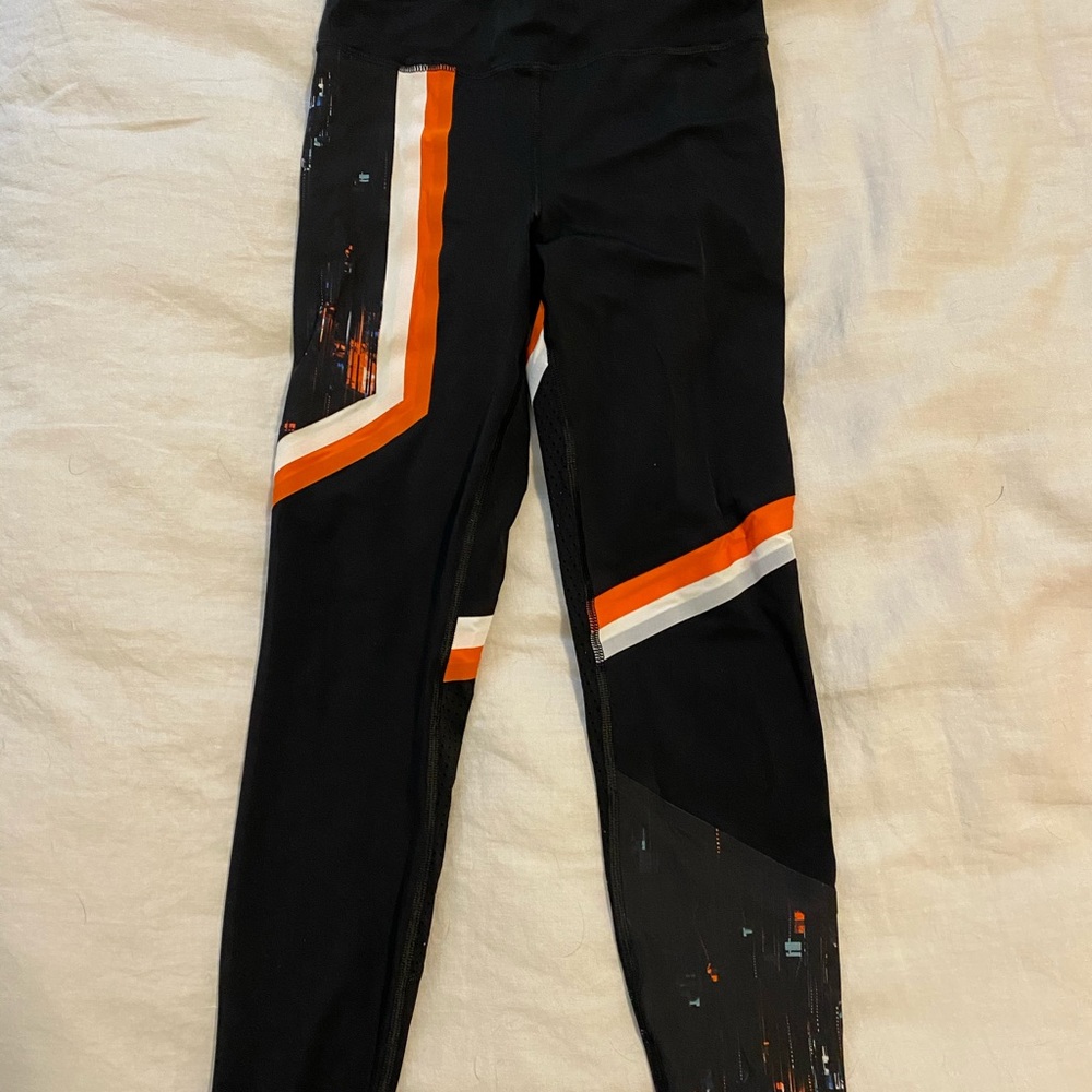 leggings with orange detail